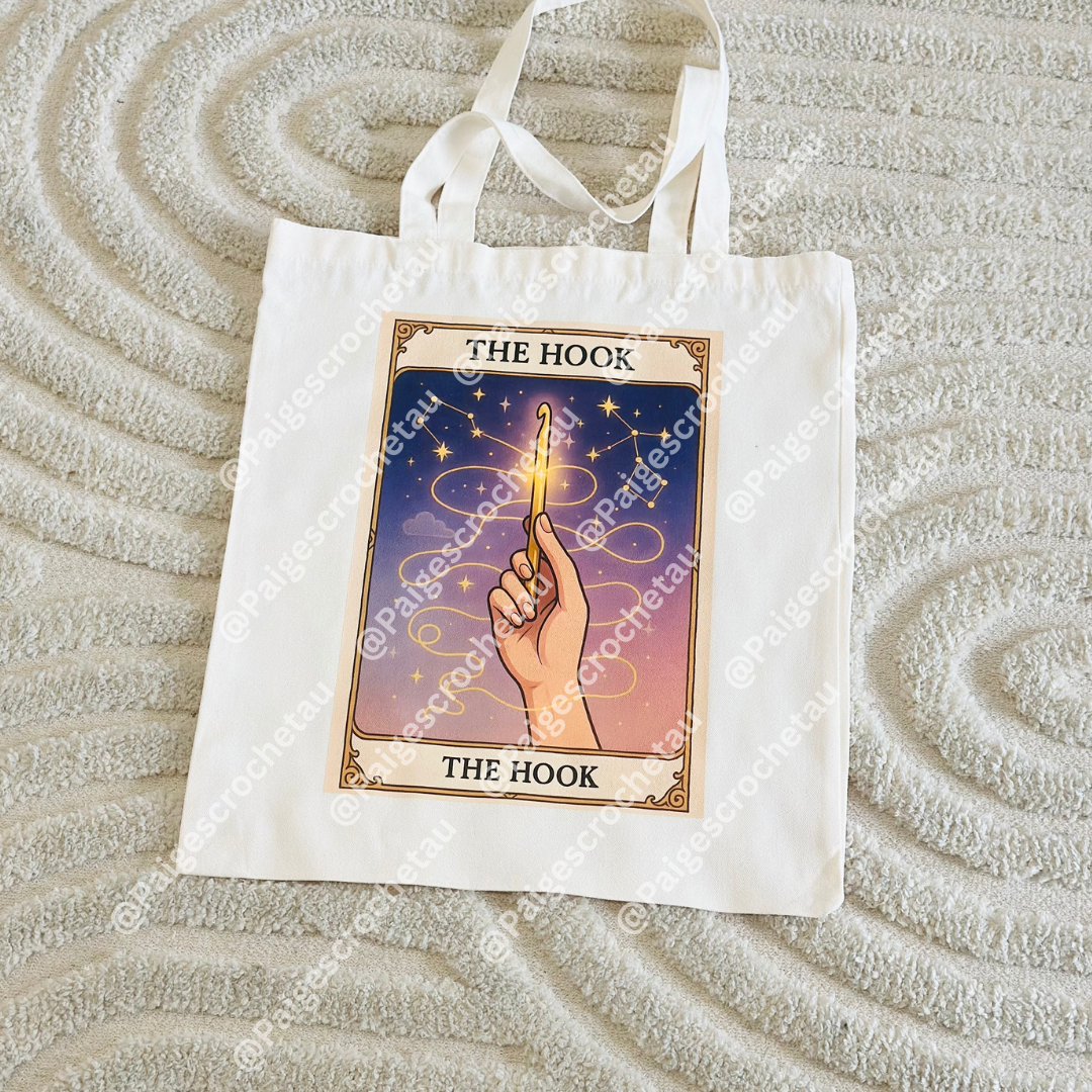 Tarot crochet tote bag with enchanted hook artwork, ideal for carrying yarn, WIPs, and crochet supplies