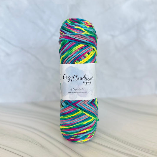 Multicolored skein of yarn with a label on a white background