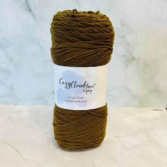Olive green skein of Cozy Cloud legacy, a 10 ply acrylic yarn 