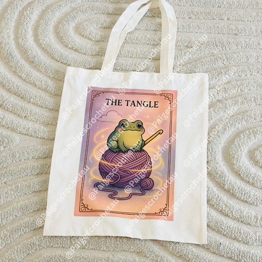 Cozy tarot crochet tote bag with comforting yarn-themed illustration, ideal for carrying WIPs, chenille and plush yarn, and crafting supplies