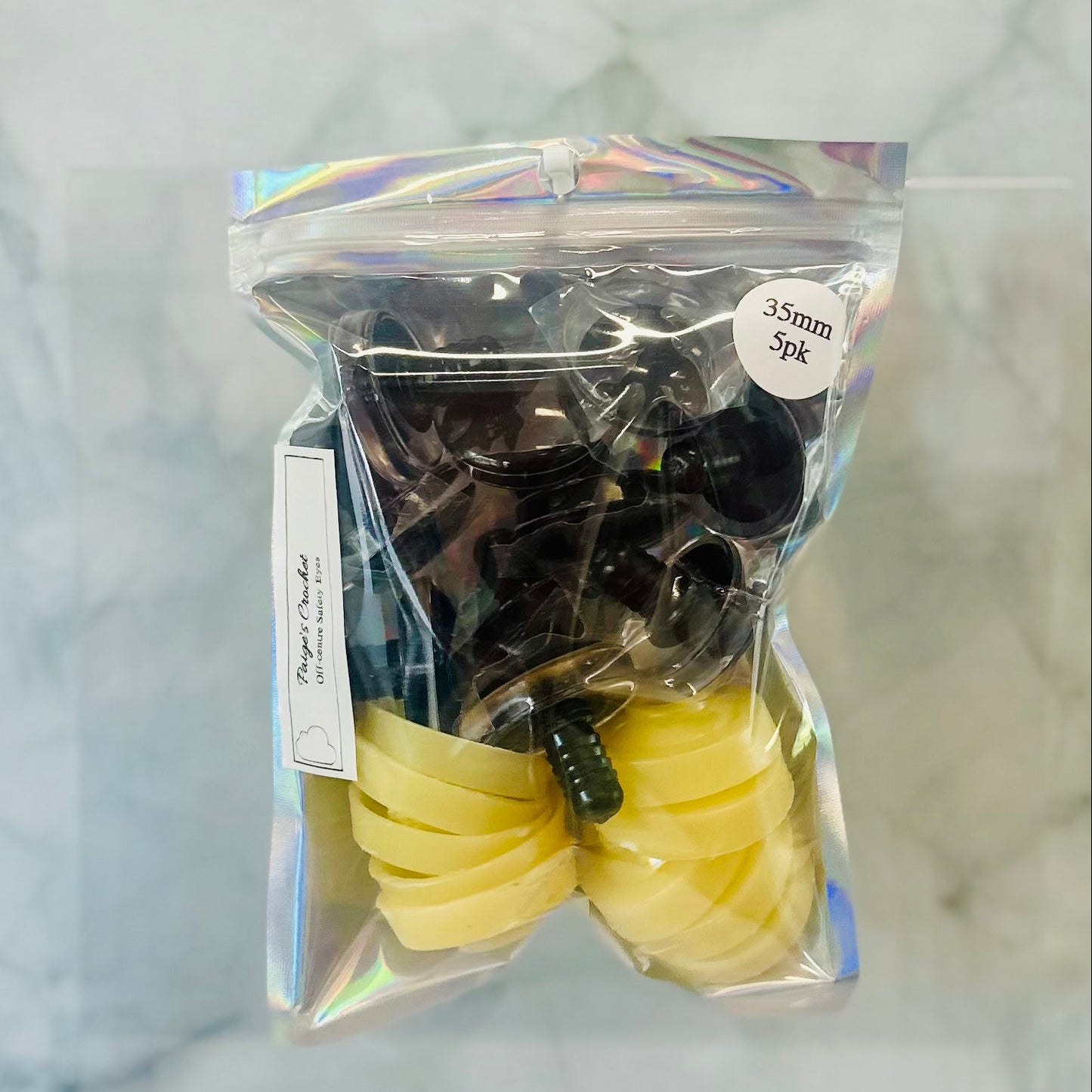 a holographic pack of safety eyes 