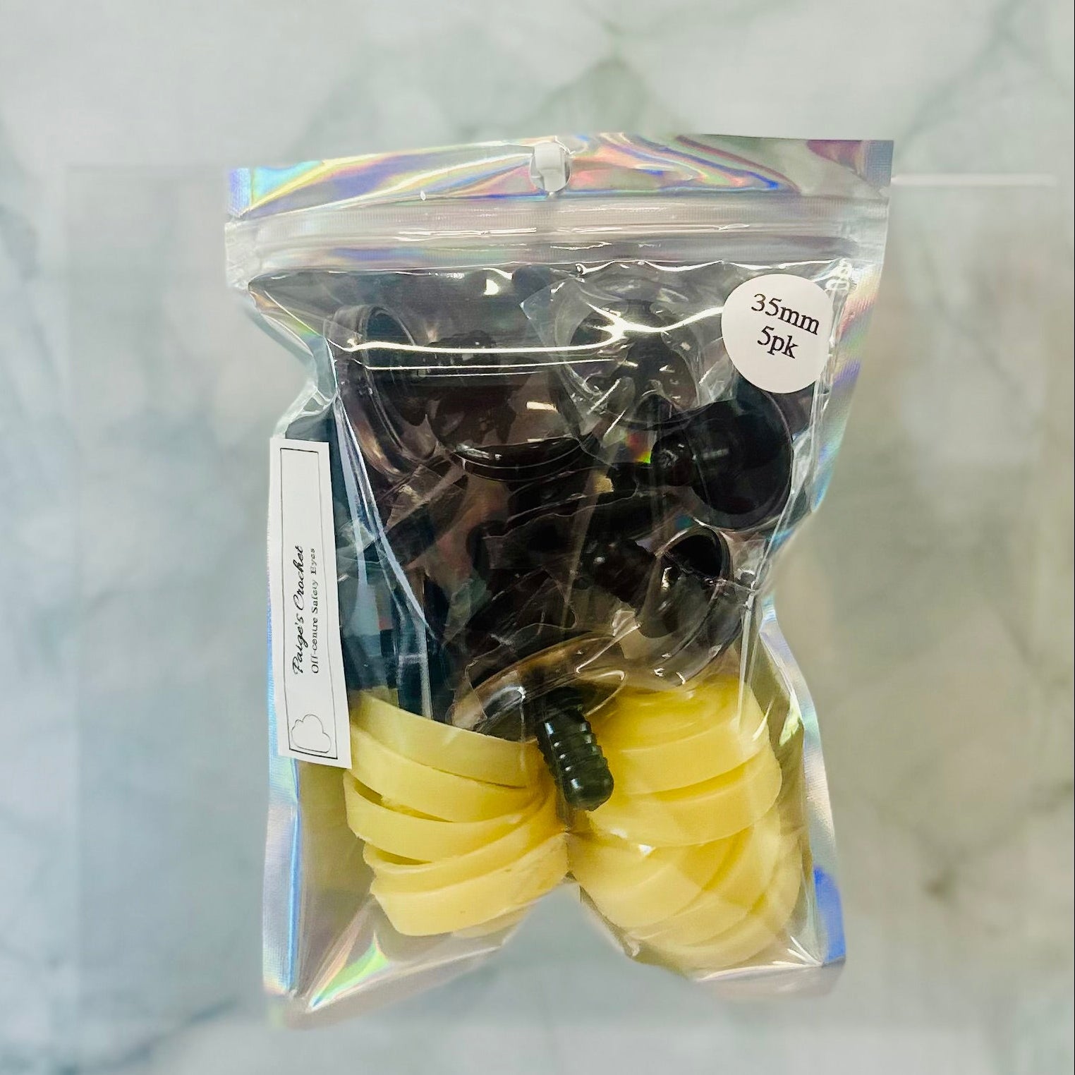 a holographic pack of safety eyes 