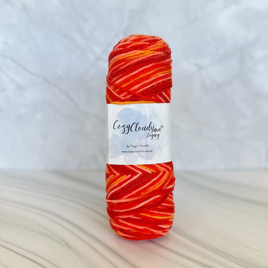 red Ball of yarn with a label on a light background