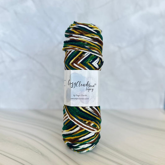 Multicolored skein of yarn with a label on a white background