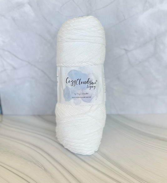White yarn ball with a label on a white background