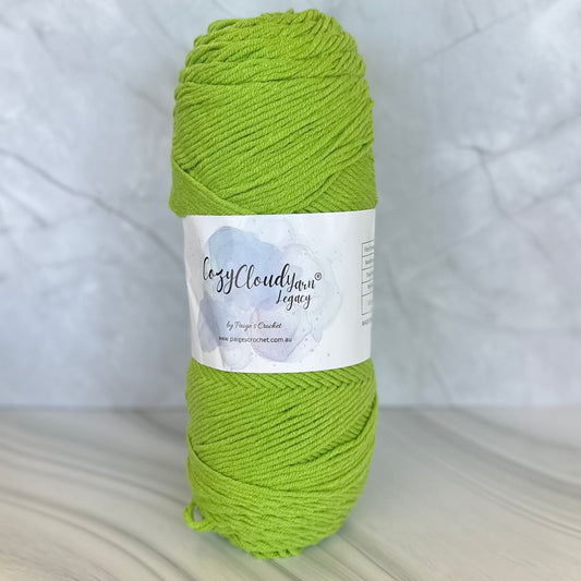Green skein of yarn with a label on a light background